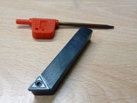 Left-hand turning knife for TCMT and TCGT inserts with exchangeable insert and key