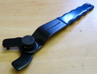 Adjustable wrench for angle grinder